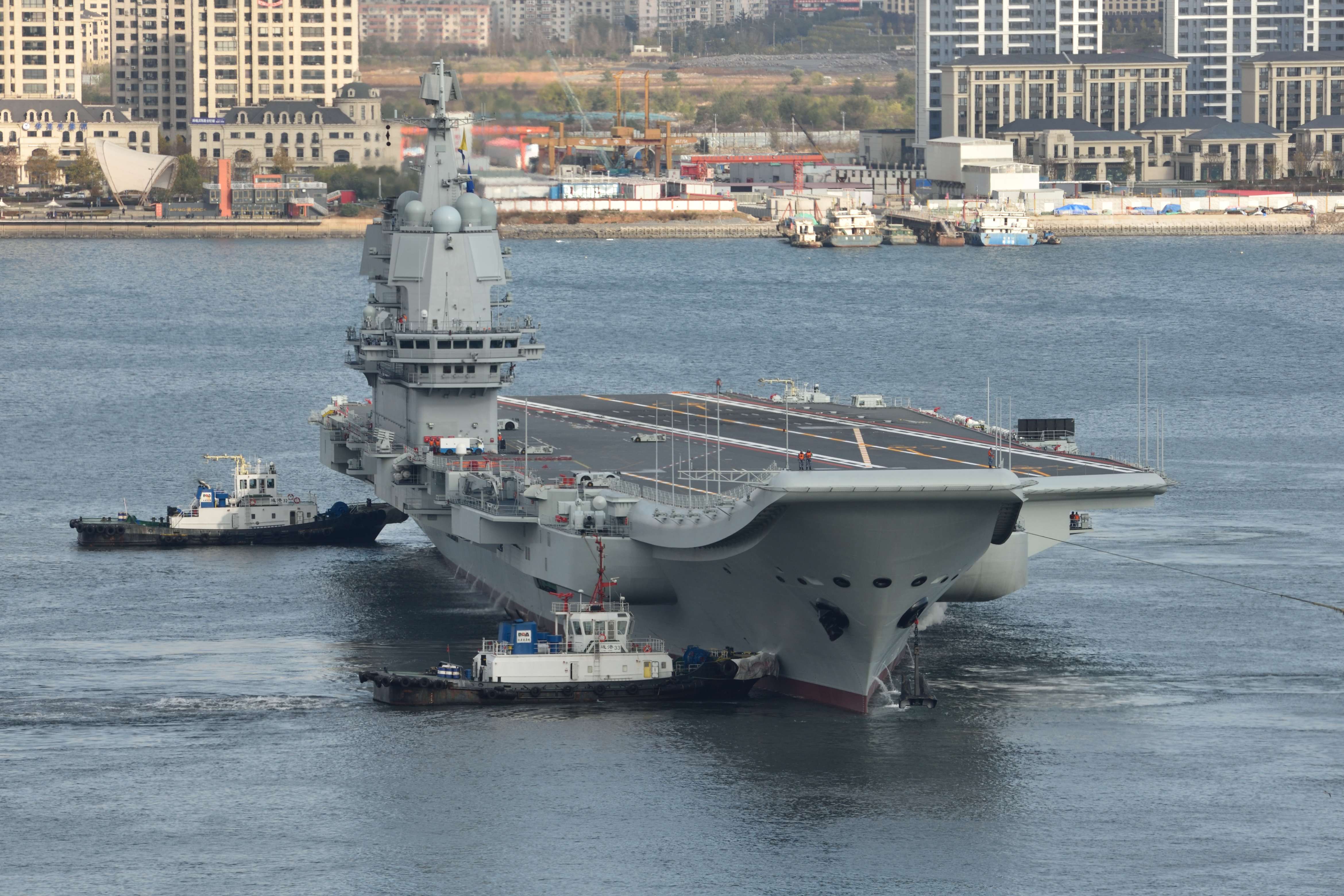 chinas-first-domestically-built-aircraft-carrier-leaves-the-news-photo-1576610574.jpg