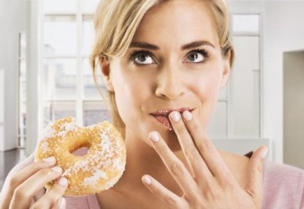 woman_eating_donut-1.jpg